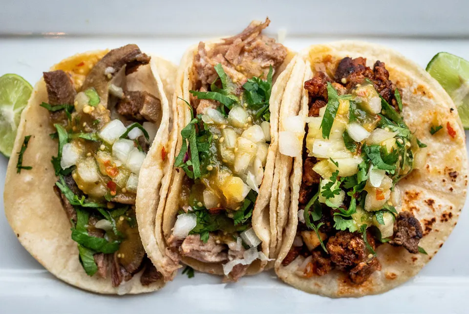 El Gallo Taqueria signature dishes Tacos al PastorCarne Asada TacosLengua TacosHorchata